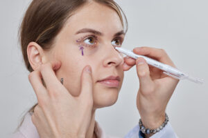 a woman getting her eye ready