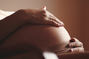 a close-up of a pregnant woman's belly